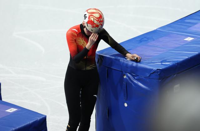 (260213) -- MILAN, Feb. 13, 2026 (Xinhua) -- Fan Kexin of China reacts after the short track speed skating women's 500m quarterfinal at the Milan-Cortina 2026 Olympic Winter Games in Milan, Italy, Feb. 12, 2026. (Xinhua/Li Ming)