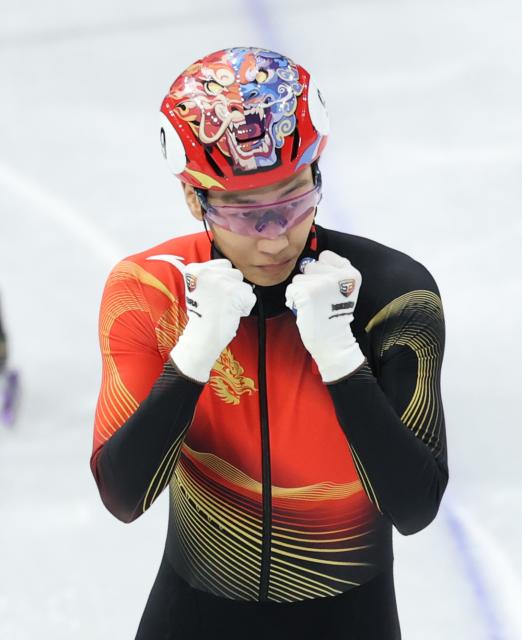 (260213) -- MILAN, Feb. 13, 2026 (Xinhua) -- Sun Long of China reacts after the short track speed skating men's 1000m semifinal at the Milan-Cortina 2026 Olympic Winter Games in Milan, Italy, Feb. 12, 2026. (Xinhua/Li Ming)