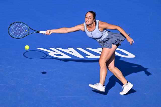 (260213) -- DOHA, Feb. 13, 2026 (Xinhua) -- Elisabetta Cocciaretto hits a return during the women's singles quarterfinal match between Jelena Ostapenko of Latvia and Elisabetta Cocciaretto of Italy at the WTA Qatar Open 2026 tennis tournament in Doha, Qatar, on Feb. 12, 2026. (Photo by Nikku/Xinhua)