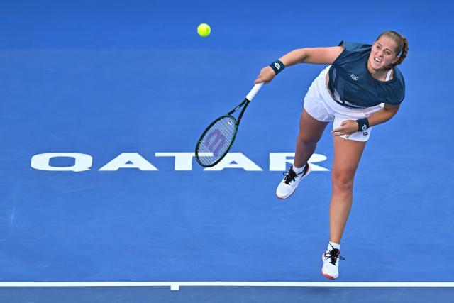 (260213) -- DOHA, Feb. 13, 2026 (Xinhua) -- Jelena Ostapenko serves during the women's singles quarterfinal match between Jelena Ostapenko of Latvia and Elisabetta Cocciaretto of Italy at the WTA Qatar Open 2026 tennis tournament in Doha, Qatar, on Feb. 12, 2026. (Photo by Nikku/Xinhua)