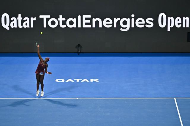 (260213) -- DOHA, Feb. 13, 2026 (Xinhua) -- Victoria Mboko serves during the women's singles quarterfinal match between Victoria Mboko of Canada and Elena Rybakina of Kazakhstan at the WTA Qatar Open 2026 tennis tournament in Doha, Qatar, on Feb. 12, 2026. (Photo by Nikku/Xinhua)