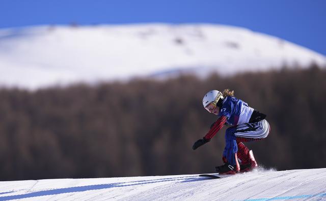 (260213) -- LIVIGNO, Feb. 13, 2026 (Xinhua) -- Karolina Hrusova of the Czech Republic competes during the snowboard women's cross seeding at the Milan-Cortina 2026 Olympic Winter Games in Livigno, Italy, Feb. 13, 2026. (Xinhua/Wu Huiwo)