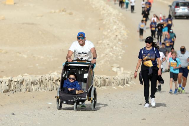 (260213) -- GIZA, Feb. 13, 2026 (Xinhua) -- Runners participate in "the Saqqara Half Marathon" in the Saqqara necropolis, Giza, Egypt, Feb. 13, 2026. (Xinhua/Ahmed Gomaa)