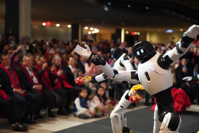 (260213) -- NEW YORK, Feb. 13, 2026 (Xinhua) -- Humanoid robots dance at a Chinese New Year gala at the UN headquarters in New York, on Feb. 12, 2026. (Xinhua/Zhang Fengguo)