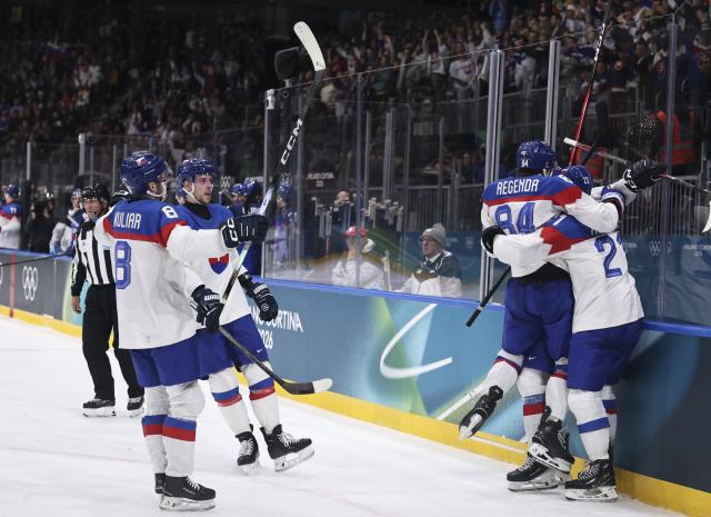 (260213) -- MILAN, Feb. 13, 2026 (Xinhua) -- Players of Slovakia celebrate during the ice hockey men's preliminary round group B match between Italy and Slovakia at the Milan-Cortina 2026 Olympic Winter Games in Milan, Italy, Feb. 13, 2026. (Xinhua/Wang Kaiyan)