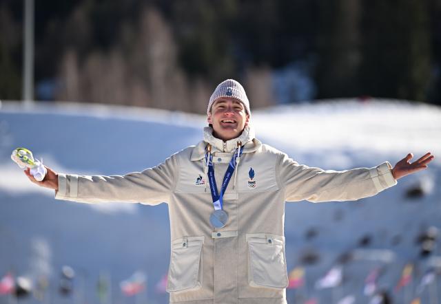 (260213) -- TESERO, Feb. 13, 2026 (Xinhua) -- Silver medalist Mathis Desloges of France reacts during the awarding ceremony for the Cross-Country Skiing Men's 10km Interval Start Free at the Milano Cortina 2026 Olympic Winter Games in Tesero, Italy, Feb. 13, 2026. (Xinhua/He Canling)