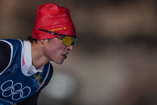 (260213) -- TESERO, Feb. 13, 2026 (Xinhua) -- Li Minglin of China competes during the Cross-Country Skiing Men's 10km Interval Start Free at the Milano Cortina 2026 Olympic Winter Games in Tesero, Italy, Feb. 13, 2026. (Xinhua/Peng Ziyang)