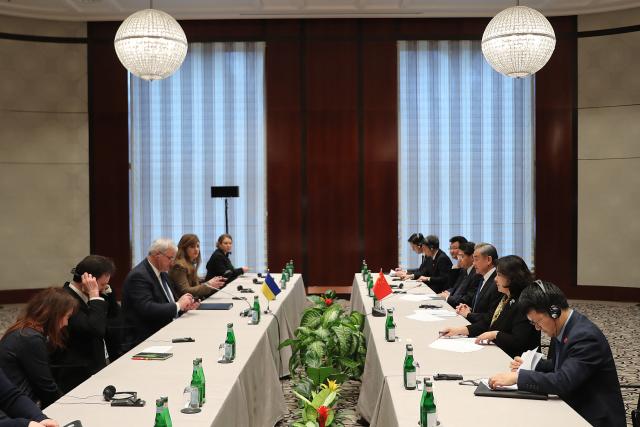 (260213) -- MUNICH, Feb. 13, 2026 (Xinhua) -- Chinese Foreign Minister Wang Yi, also a member of the Political Bureau of the Communist Party of China Central Committee, meets with Ukrainian Foreign Minister Andrii Sybiha on the sidelines of the Munich Security Conference in Munich, Germany, Feb. 13, 2026. (Xinhua/Du Zheyu)