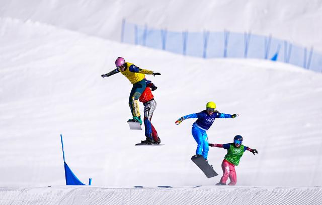 (260213) -- LIVIGNO, Feb. 13, 2026 (Xinhua) -- Josie Baff of Australia, Eva Adamczykova of Czech Republic, Michela Moioli of Italy and Noemie Wiedmer of Switzerland (L to R) compete during the women's snowboard cross big final at the Milan-Cortina 2026 Olympic Winter Games in Livigno, Italy, Feb. 13, 2026. (Xinhua/Wu Huiwo)