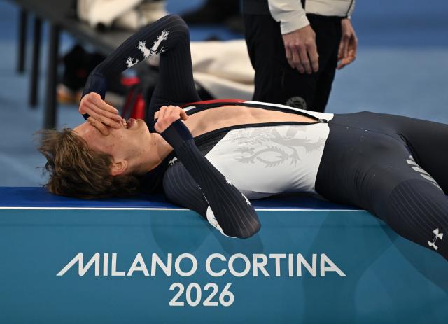 (260213) -- MILAN, Feb. 13, 2026 (Xinhua) -- Metodej Jilek of the Czech Republic takes a break after the speed skating men's 10000m event at the Milan-Cortina 2026 Olympic Winter Games in Milan, Italy, Feb. 13, 2026. (Xinhua/Wu Wei)