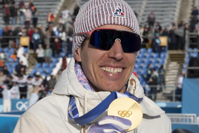 (260213) -- ANTERSELVA, Feb. 13, 2026 (Xinhua) -- Gold medalist Quentin Fillon Maillet of France shows his medal during the awarding ceremony of the biathlon men's 10km sprint event at the Milan-Cortina 2026 Olympic Winter Games in Anterselva, Italy, Feb. 13, 2026. (Xinhua/Zhang Tao)
