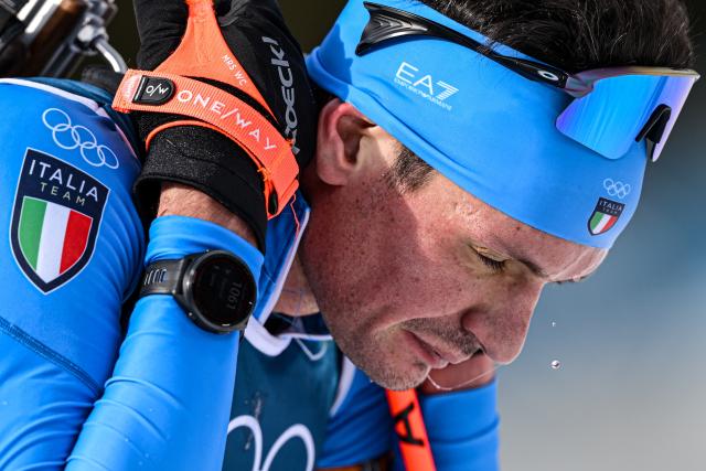 (260213) -- ANTERSELVA, Feb. 13, 2026 (Xinhua) -- Tommaso Giacomel of Italy reacts after the biathlon men's 10km sprint event at the Milan-Cortina 2026 Olympic Winter Games in Anterselva, Italy, Feb. 13, 2026. (Xinhua/Jiang Han)