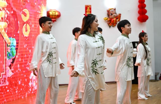 (260213) -- ALMATY, Feb. 13, 2026 (Xinhua) -- Students of Al-Farabi Kazakh National University perform a dance during a Chinese New Year cultural event in Almaty, Kazakhstan, Feb. 13, 2026. (Xinhua/Li Renzi)