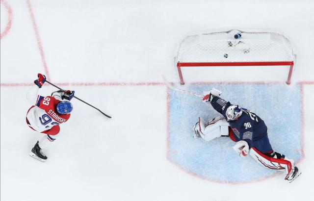 (260213) -- MILAN, Feb. 13, 2026 (Xinhua) -- Matej Stransky of the Czech Republic scores during the ice hockey men's preliminary round group A match between France and the Czech Republic at the Milan-Cortina 2026 Olympic Winter Games in Milan, Italy, Feb. 13, 2026. (Xinhua/Zhang Haofu)