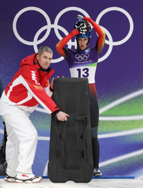 (260213) -- CORTINA D'AMPEZZO, Feb. 13, 2026 (Xinhua) -- Zhao Dan of China prepares to start before the skeleton women competition heat 2 at the Milan-Cortina 2026 Olympic Winter Games in Cortina, Italy, Feb. 13, 2026. (Xinhua/Ding Xu)