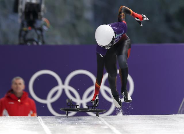 (260213) -- CORTINA D'AMPEZZO, Feb. 13, 2026 (Xinhua) -- Liang Yuxin of China competes during the skeleton women competition heat 1 at the Milan-Cortina 2026 Olympic Winter Games in Cortina, Italy, Feb. 13, 2026. (Xinhua/Ding Xu)
