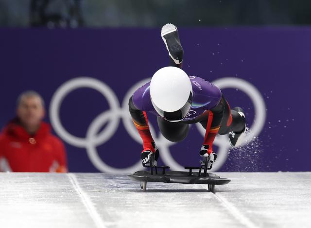 (260213) -- CORTINA D'AMPEZZO, Feb. 13, 2026 (Xinhua) -- Liang Yuxin of China competes during the skeleton women competition heat 1 at the Milan-Cortina 2026 Olympic Winter Games in Cortina, Italy, Feb. 13, 2026. (Xinhua/Ding Xu)