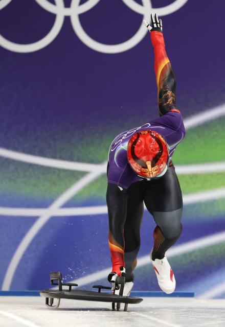 (260213) -- CORTINA D'AMPEZZO, Feb. 13, 2026 (Xinhua) -- Yin Zheng of China competes during the skeleton men competition heat 3 at the Milan-Cortina 2026 Olympic Winter Games in Cortina, Italy, Feb. 13, 2026. (Xinhua/Ding Xu)