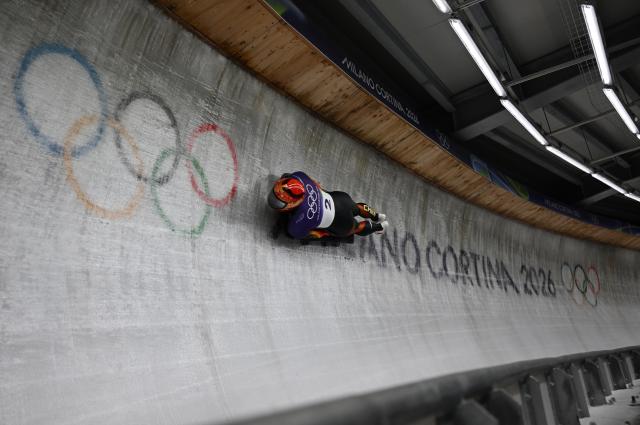 (260213) -- CORTINA D'AMPEZZO, Feb. 13, 2026 (Xinhua) -- Yin Zheng of China competes during the skeleton men competition heat 3 at the Milan-Cortina 2026 Olympic Winter Games in Cortina, Italy, Feb. 13, 2026. (Xinhua/Lian Yi)