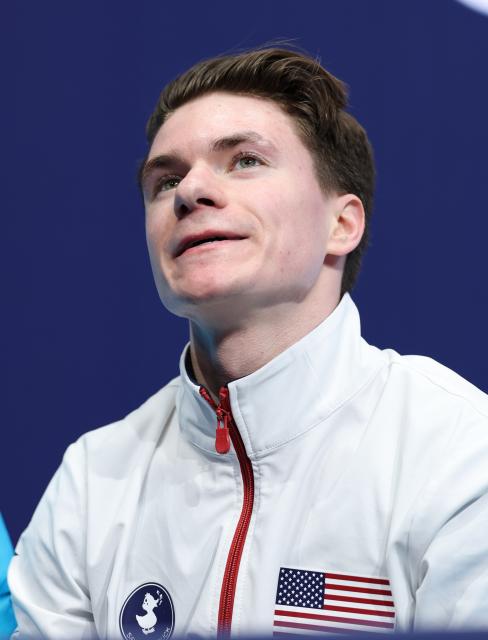 (260213) -- MILAN, Feb. 13, 2026 (Xinhua) -- Maxim Naumov of the United States waits for his score after the free skating of the men single skating match for figure skating event at the Milan-Cortina 2026 Olympic Winter Games in Milan, Italy, Feb. 13, 2026. (Xinhua/Li Ming)