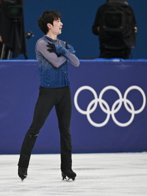 (260213) -- MILAN, Feb. 13, 2026 (Xinhua) -- Jin Boyang of China competes during the free skating of the men single skating match for figure skating event at the Milan-Cortina 2026 Olympic Winter Games in Milan, Italy, Feb. 13, 2026. (Xinhua/Cheng Min)