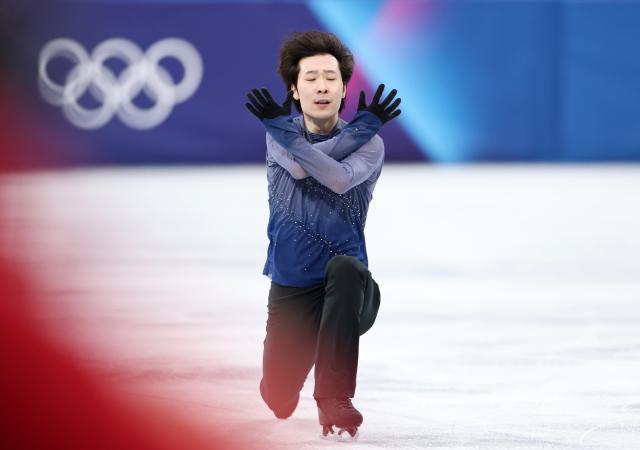 (260213) -- MILAN, Feb. 13, 2026 (Xinhua) -- Jin Boyang of China competes during the free skating of the men single skating match for figure skating event at the Milan-Cortina 2026 Olympic Winter Games in Milan, Italy, Feb. 13, 2026. (Xinhua/Li Ming)