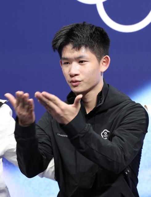 (260213) -- MILAN, Feb. 13, 2026 (Xinhua) -- Li Yu-Hsiang of Chinese Taipei reacts after the free skating of the men single skating match for figure skating event at the Milan-Cortina 2026 Olympic Winter Games in Milan, Italy, Feb. 13, 2026. (Xinhua/Li Ming)