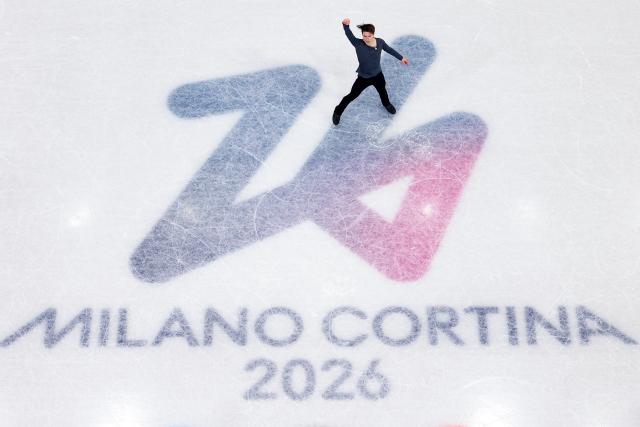 (260213) -- MILAN, Feb. 13, 2026 (Xinhua) -- Maxim Naumov of the United States competes during the free skating of the men single skating match for figure skating event at the Milan-Cortina 2026 Olympic Winter Games in Milan, Italy, Feb. 13, 2026. (Xinhua/Chen Yichen)