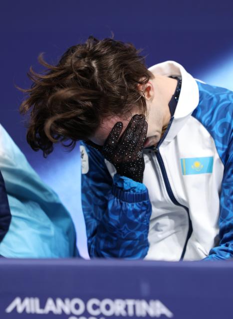 (260213) -- MILAN, Feb. 13, 2026 (Xinhua) -- Mikhail Shaidorov of Kazakhstan weeps during the free skating of the men single skating match for figure skating event at the Milan-Cortina 2026 Olympic Winter Games in Milan, Italy, Feb. 13, 2026. (Xinhua/Li Ming)