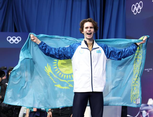 (260213) -- MILAN, Feb. 13, 2026 (Xinhua) -- Mikhail Shaidorov of Kazakhstan celebrates after the free skating of the men single skating match for figure skating event at the Milan-Cortina 2026 Olympic Winter Games in Milan, Italy, Feb. 13, 2026. (Xinhua/Li Ming)