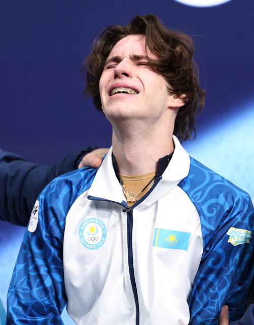 (260213) -- MILAN, Feb. 13, 2026 (Xinhua) -- Mikhail Shaidorov of Kazakhstan weeps during the free skating of the men single skating match for figure skating event at the Milan-Cortina 2026 Olympic Winter Games in Milan, Italy, Feb. 13, 2026. (Xinhua/Li Ming)