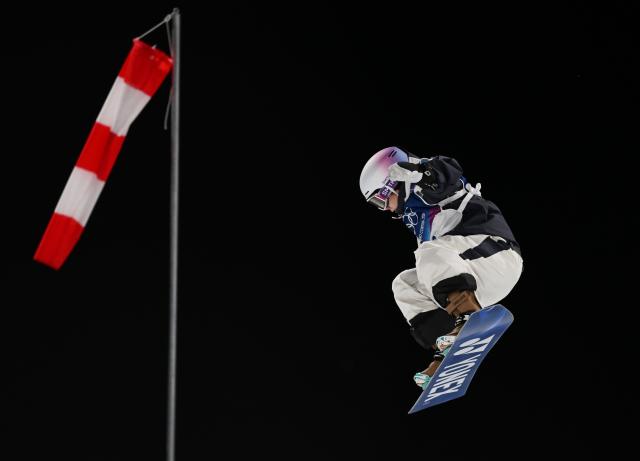 (260213) -- LIVIGNO, Feb. 13, 2026 (Xinhua) -- Totsuka Yuto of Japan competes during the men's snowboard halfpipe final at the Milan-Cortina 2026 Olympic Winter Games in Livigno, Italy, Feb. 13, 2026. (Xinhua/Xia Yifang)