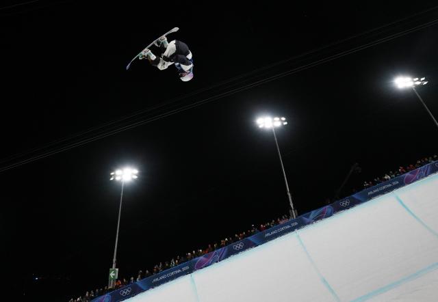 (260213) -- LIVIGNO, Feb. 13, 2026 (Xinhua) -- Totsuka Yuto of Japan competes during the men's snowboard halfpipe final at the Milan-Cortina 2026 Olympic Winter Games in Livigno, Italy, Feb. 13, 2026. (Xinhua/Xia Yifang)