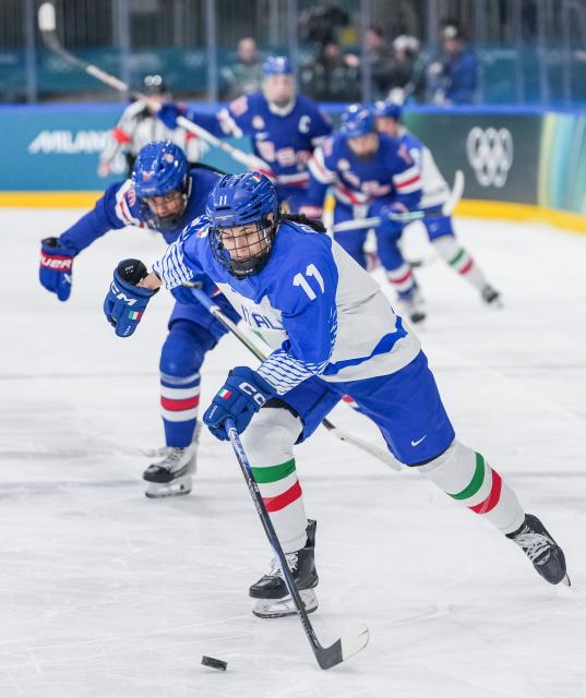 (260214) -- MILAN, Feb. 14, 2026 (Xinhua) -- Justine Reyes of Italy competes during the ice hockey women's play-offs quarterfinal match between the United States and Italy at the Milan-Cortina 2026 Olympic Winter Games in Milan, Italy, Feb. 13, 2026. (Xinhua/Sun Fei)