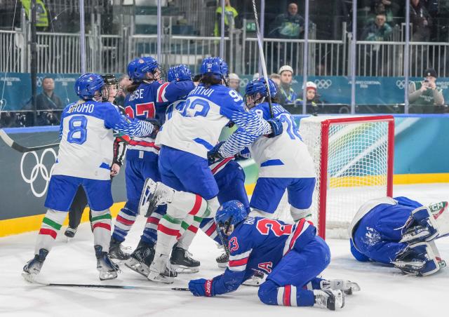 (260214) -- MILAN, Feb. 14, 2026 (Xinhua) -- Players conflict during the ice hockey women's play-offs quarterfinal match between the United States and Italy at the Milan-Cortina 2026 Olympic Winter Games in Milan, Italy, Feb. 13, 2026. (Xinhua/Sun Fei)