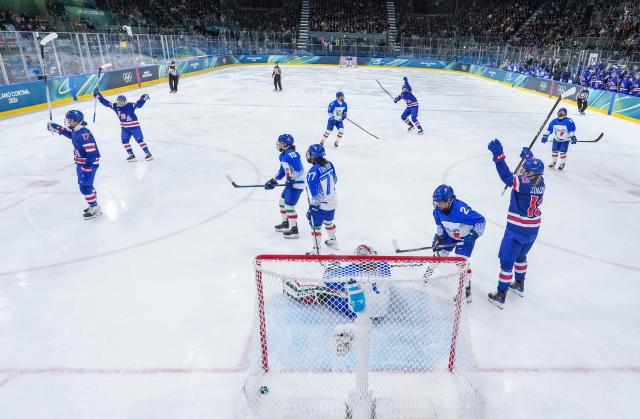 (260214) -- MILAN, Feb. 14, 2026 (Xinhua) -- Players of the United States celebrate a goal during the ice hockey women's play-offs quarterfinal match between the United States and Italy at the Milan-Cortina 2026 Olympic Winter Games in Milan, Italy, Feb. 13, 2026. (Xinhua/Sun Fei)