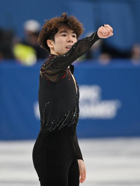 (260214) -- MILAN, Feb. 14, 2026 (Xinhua) -- Sato Shun of Japan reacts after his performance during the men's single skating free skating of figure skating event at the Milan-Cortina 2026 Olympic Winter Games in Milan, Italy, Feb. 13, 2026. (Xinhua/Cheng Min)