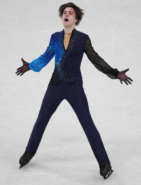 (260214) -- MILAN, Feb. 14, 2026 (Xinhua) -- Mikhail Shaidorov of Kazakhstan performs during the men's single skating free skating of figure skating event at the Milan-Cortina 2026 Olympic Winter Games in Milan, Italy, Feb. 13, 2026. (Xinhua/Xue Yuge)
