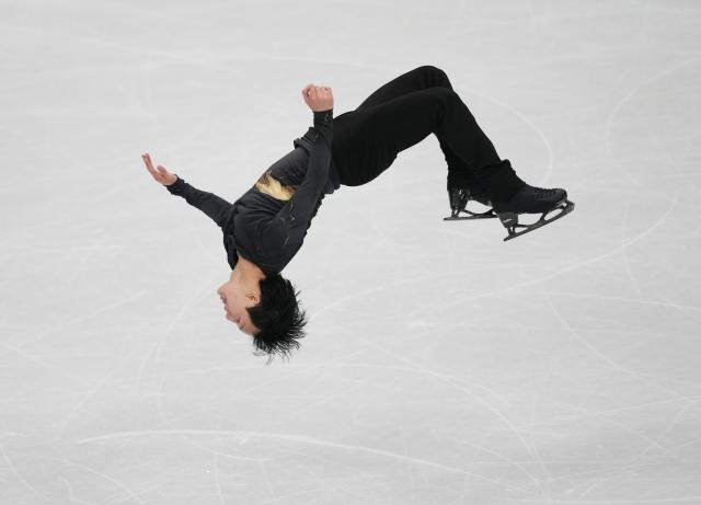 (260214) -- MILAN, Feb. 14, 2026 (Xinhua) -- Adam Siao Him Fa of France performs during the men's single skating free skating of figure skating event at the Milan-Cortina 2026 Olympic Winter Games in Milan, Italy, Feb. 13, 2026. (Xinhua/Xue Yuge)
