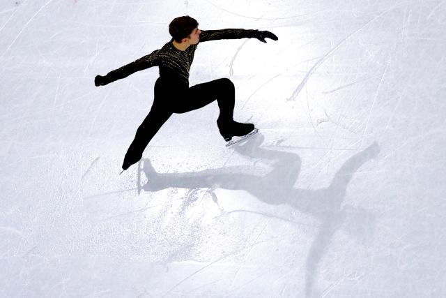 (260214) -- MILAN, Feb. 14, 2026 (Xinhua) -- Andrew Torgashev of the United States performs during the men's single skating free skating of figure skating event at the Milan-Cortina 2026 Olympic Winter Games in Milan, Italy, Feb. 13, 2026. (Xinhua/Chen Yichen)