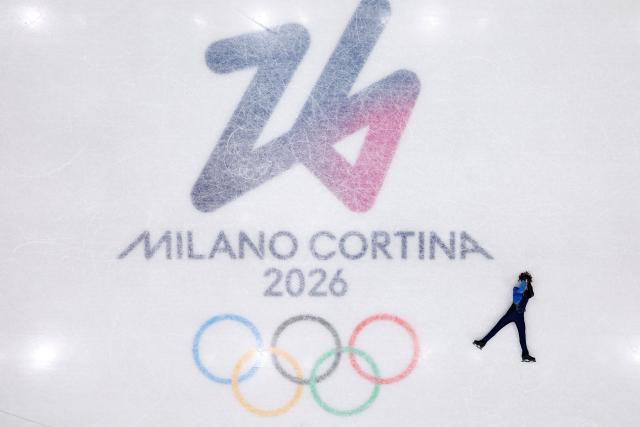 (260214) -- MILAN, Feb. 14, 2026 (Xinhua) -- Mikhail Shaidorov of Kazakhstan reacts after his performance during the men's single skating free skating of figure skating event at the Milan-Cortina 2026 Olympic Winter Games in Milan, Italy, Feb. 13, 2026. (Xinhua/Chen Yichen)