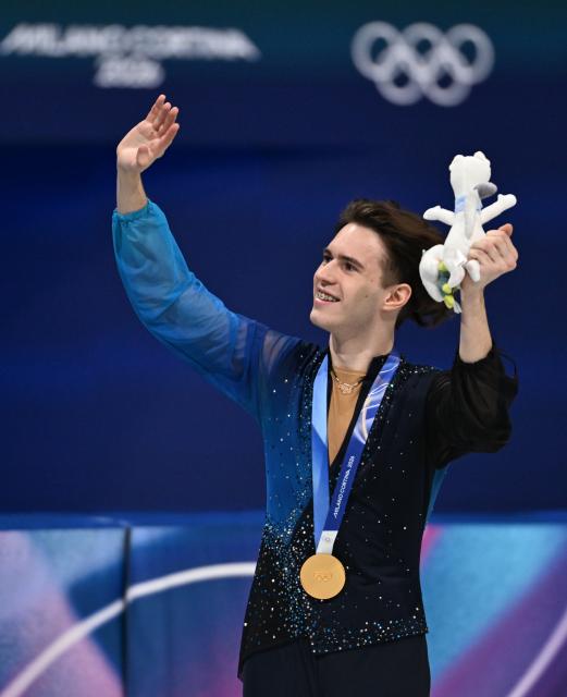 (260214) -- MILAN, Feb. 14, 2026 (Xinhua) -- Mikhail Shaidorov of Kazakhstan celebrates during the awarding ceremony for the men's single skating free skating of figure skating event at the Milan-Cortina 2026 Olympic Winter Games in Milan, Italy, Feb. 13, 2026. (Xinhua/Cheng Min)