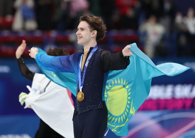 (260214) -- MILAN, Feb. 14, 2026 (Xinhua) -- Mikhail Shaidorov of Kazakhstan celebrates after winning the men's single skating free skating of figure skating event at the Milan-Cortina 2026 Olympic Winter Games in Milan, Italy, Feb. 13, 2026. (Xinhua/Li Ming)