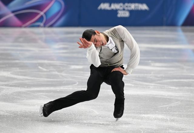 (260214) -- MILAN, Feb. 14, 2026 (Xinhua) -- Petr Gumennik of Individual Neutral Athletes performs during the men's single skating free skating of figure skating event at the Milan-Cortina 2026 Olympic Winter Games in Milan, Italy, Feb. 13, 2026. (Xinhua/Cheng Min)