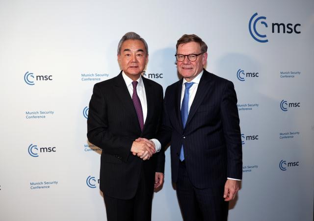 (260213) -- MUNICH, Feb. 13, 2026 (Xinhua) -- Chinese Foreign Minister Wang Yi, also a member of the Political Bureau of the Communist Party of China Central Committee, meets with German Foreign Minister Johann Wadephul on the sidelines of the Munich Security Conference in Munich, Germany, Feb. 13, 2026. (Xinhua/Li Ying)