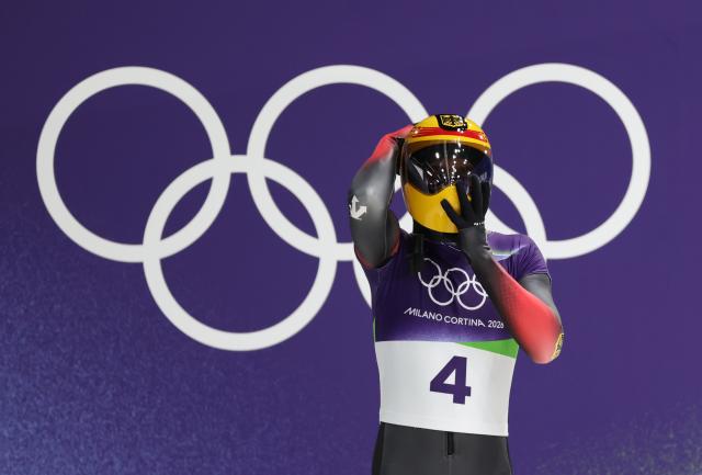 (260214) -- CORTINA D'AMPEZZO, Feb. 14, 2026 (Xinhua) -- Axel Jungk of Germany gets ready to compete during the skeleton men competition heat 3 at the Milan-Cortina 2026 Olympic Winter Games in Cortina, Italy, Feb. 13, 2026. (Xinhua/Ding Xu)