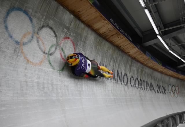 (260214) -- CORTINA D'AMPEZZO, Feb. 14, 2026 (Xinhua) -- Axel Jungk of Germany competes during the skeleton men competition heat 3 at the Milan-Cortina 2026 Olympic Winter Games in Cortina, Italy, Feb. 13, 2026. (Xinhua/Lian Yi)