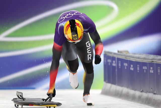 (260214) -- CORTINA D'AMPEZZO, Feb. 14, 2026 (Xinhua) -- Axel Jungk of Germany competes during the skeleton men competition heat 3 at the Milan-Cortina 2026 Olympic Winter Games in Cortina, Italy, Feb. 13, 2026. (Xinhua/Ding Xu)