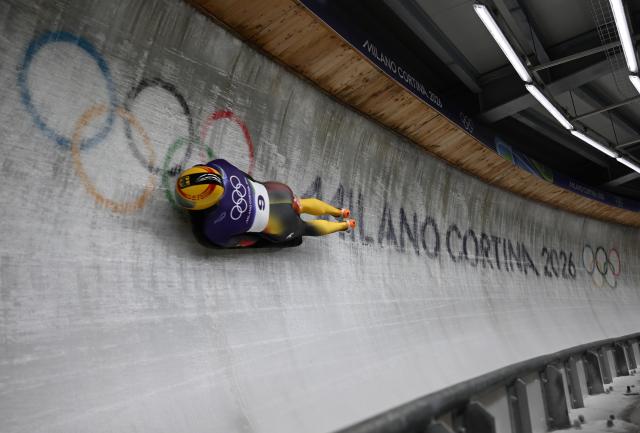 (260214) -- CORTINA D'AMPEZZO, Feb. 14, 2026 (Xinhua) -- Felix Keisinger of Germany competes during the skeleton men competition heat 3 at the Milan-Cortina 2026 Olympic Winter Games in Cortina, Italy, Feb. 13, 2026. (Xinhua/Lian Yi)