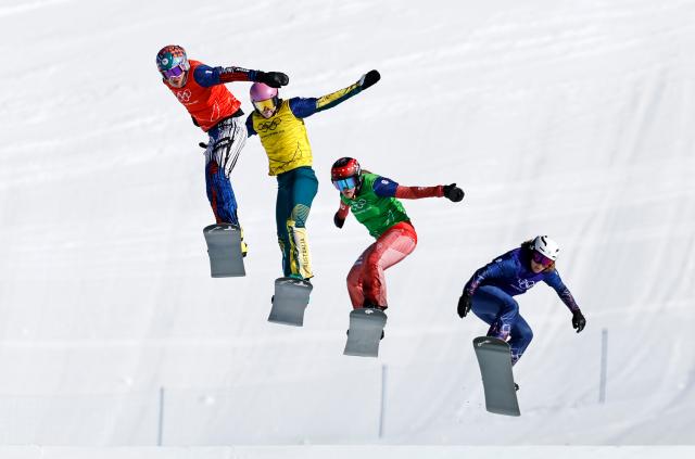 (260214) -- LIVIGNO, Feb. 14, 2026 (Xinhua) -- Eva Adamczykova of the Czech Republic, Josie Baff of Australia, Sina Siegenthaler of Switzerland and Charlotte Bankes of Britain (L to R) compete during the women's snowboard cross quarterfinal at the Milan-Cortina 2026 Olympic Winter Games in Livigno, Italy, Feb. 13, 2026. (Xinhua/Wang Peng)